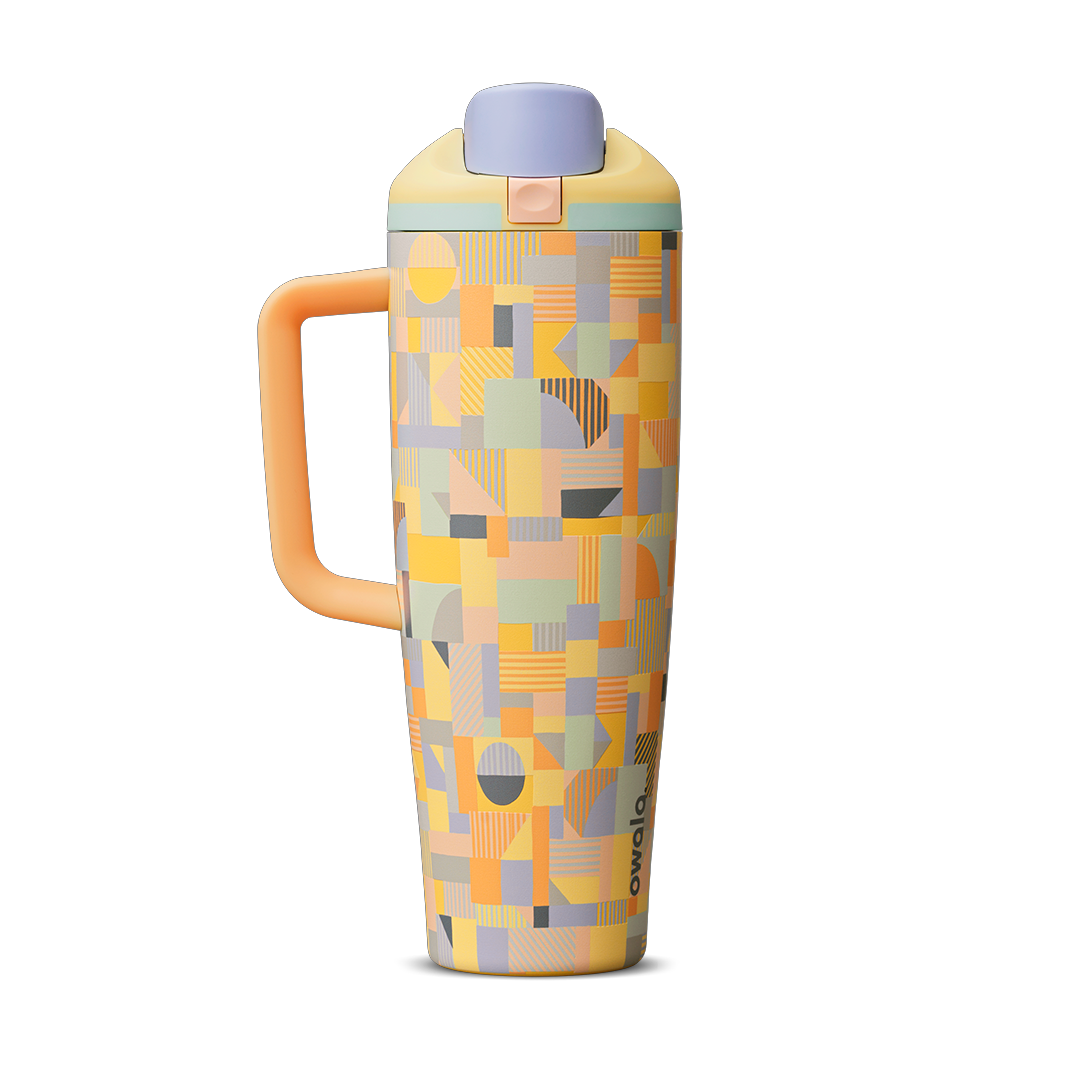 Owala FreeSip Tumbler 40oz, pastel geometric patchwork body in yellow, orange, peach, mint, and lavender tones with mint lid, lavender flip cap, and orange side handle